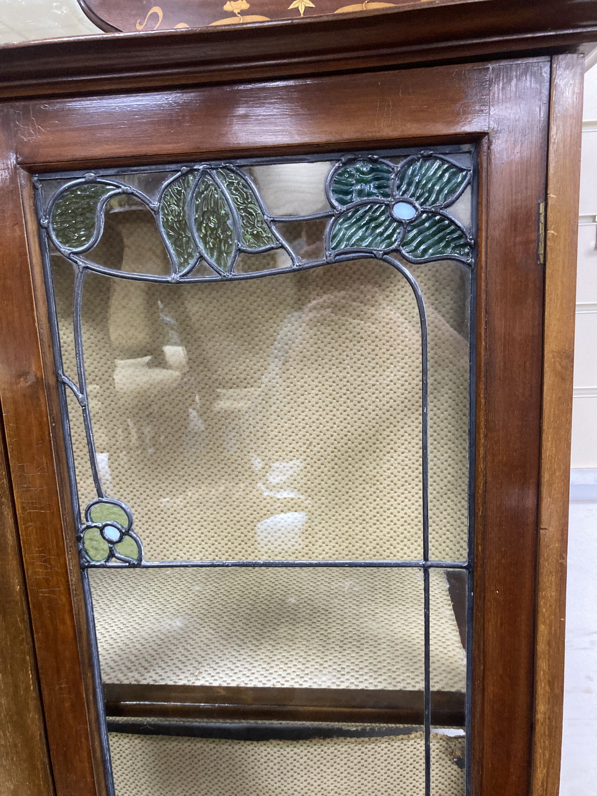 An Edwardian Art Nouveau marquetry inlaid mahogany display cabinet,